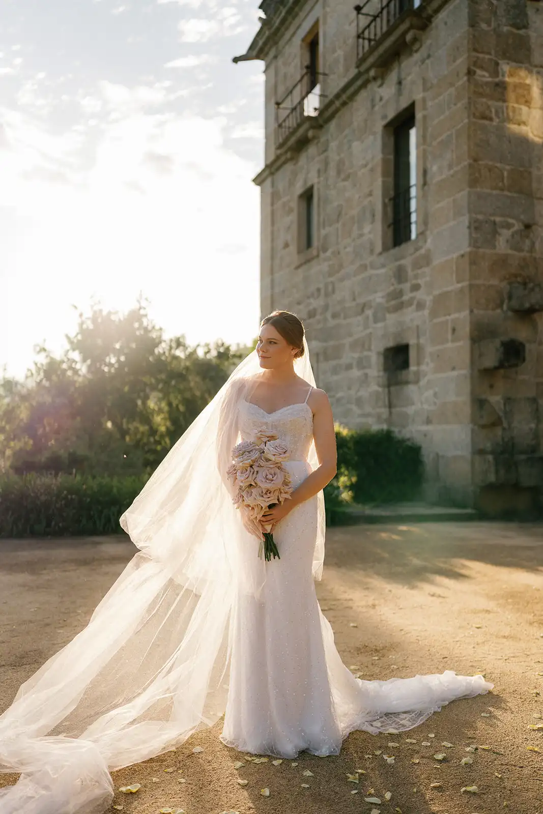 Beautiful light illuminating the bride in the gardens of the Amares Monastery.