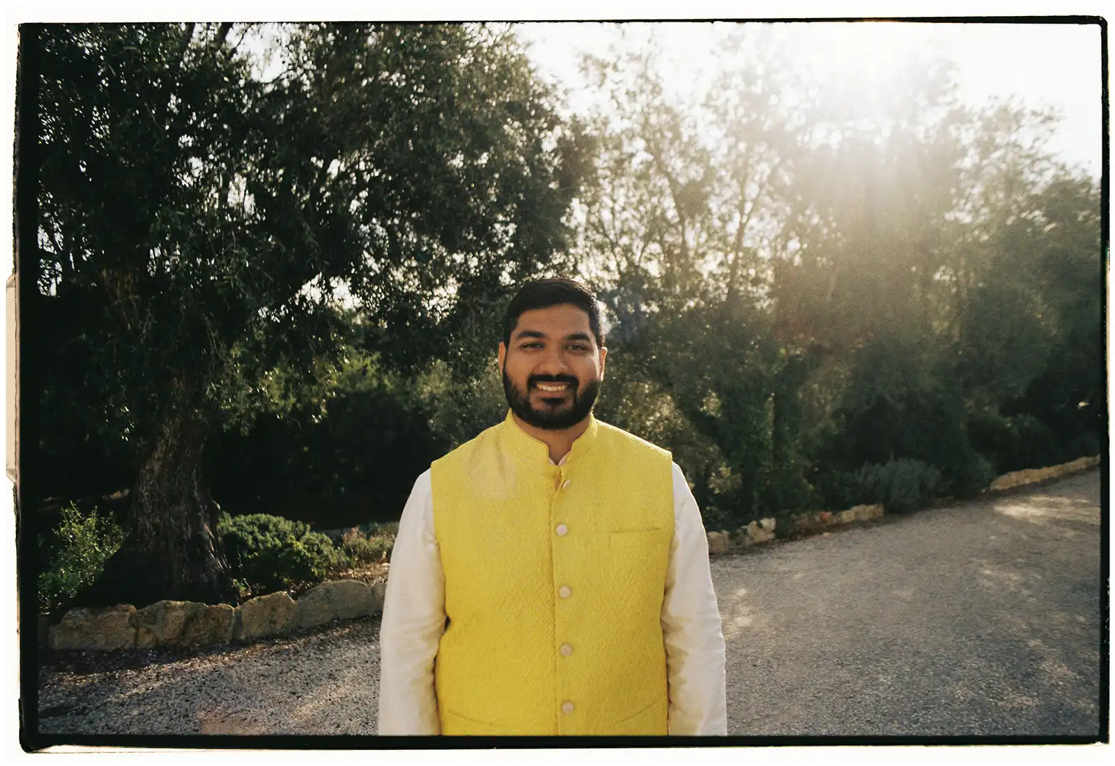Indian wedding in Portugal. Groom ready for Haldi in a yellow outfit.